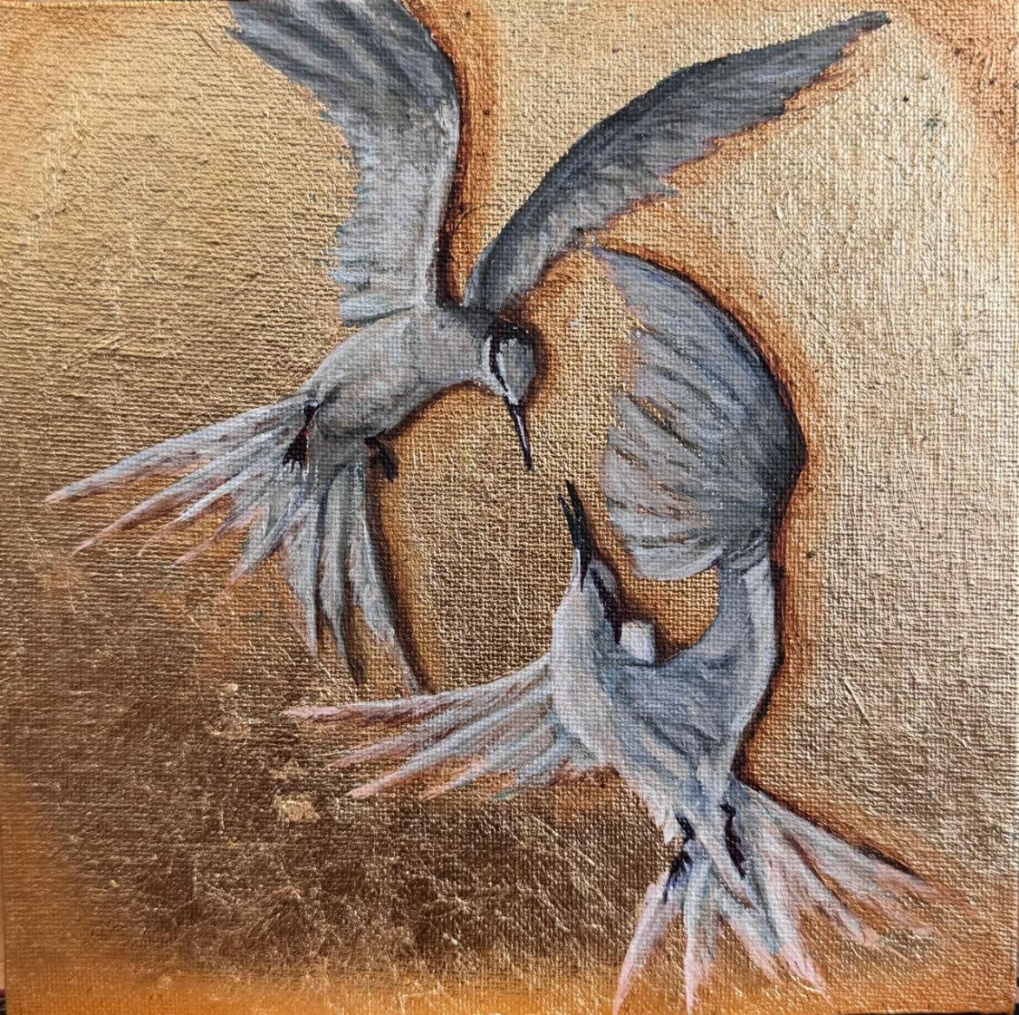 Two terns wheeling in flight against a gold ground