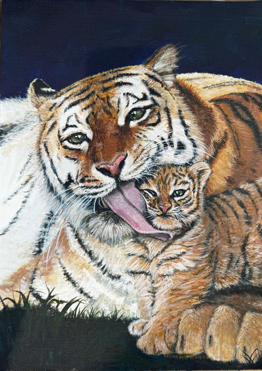 A tigress licking her cub against a night-blue sky